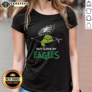 Awesome Grinch tee for ladies featuring 'I Hate People But I Love My Philadelphia Eagles' for a festive football vibe.