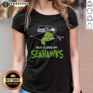 Alt Text: Ladies tee featuring 'I Hate People But I Love My Seattle Seahawks' design with Grinch graphic for Christmas.