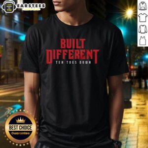 Alt Text: Good Built Different Ten Toes Down T-Shirt featuring a bold graphic design, perfect for casual wear and self-expression.