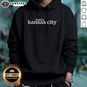 Stylish Nice Maxs Kansas City hoodie displayed on a wooden background, perfect for fans and casual wear.