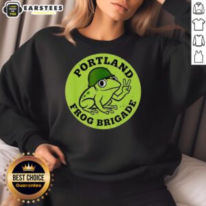 Nice Portland Frog Brigade protest sweatshirt featuring vibrant frog graphics and a bold message on activism.