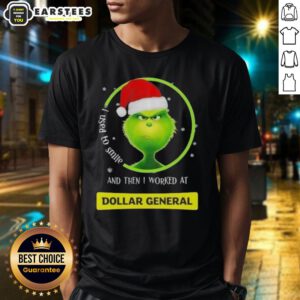 Premium Grinch Christmas T-shirt featuring 'I Used To Smile And Then I Worked At Dollar General' text design.