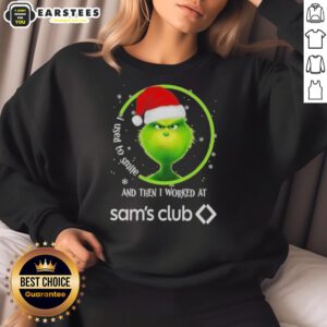 Alt Text: Premium Grinch Christmas sweatshirt featuring I Used To Smile And Then I Worked At Sam's Club design for festive humor.