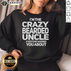 Premium I'm The Crazy Bearded Uncle Everyone Warned You About Sweatshirt in a cozy setting, showcasing fun design.