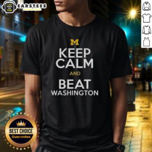 Premium Michigan Wolverines 'Keep Calm And Beat Washington' T-Shirt featuring bold graphics and team colors.