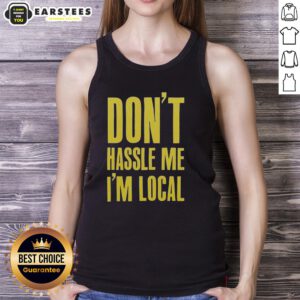 Stylish 'Don't Hassle Me I'm Local' tank top displayed on a hanger, perfect for summer outings and casual wear.