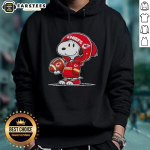 Alt Text: Cute Peanuts Snoopy in a Kansas City Chiefs hoodie, smiling at fans with a cheerful expression.
