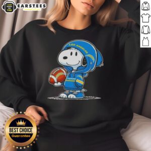Alt Text: Cute Snoopy in a Los Angeles Chargers hoodie smiling at fans, showcasing a playful sweatshirt design.