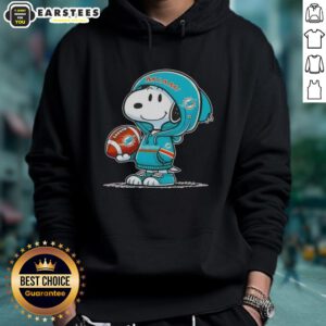 Alt Text: Cute Peanuts Snoopy wearing Miami Dolphins hoodie, smiling at fans, showcasing team spirit and playful charm.