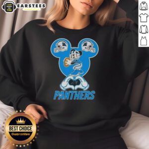 Good Mickey hands forming a heart on a Carolina Panthers football sweatshirt, showcasing team spirit and love.