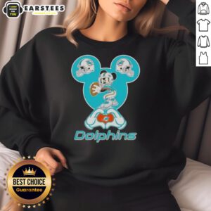 Good Mickey hands forming a heart on a Miami Dolphins football sweatshirt, perfect for fans and casual wear.