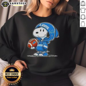 Alt Text: Snoopy wearing a Detroit Lions hoodie smiles at fans, showcasing the Good Peanuts sweatshirt design.
