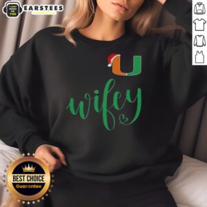 Good Wifey Miami Hurricanes sweatshirt with Santa hat for a festive Merry Christmas celebration.