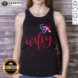 Happy Wifey in a Houston Texans tank top and Santa hat, celebrating Christmas with festive cheer.