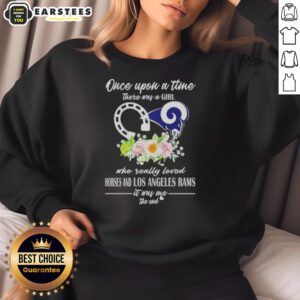 Alt Text: Official sweatshirt featuring 'Once Upon A Time There Was A Girl Who Really Loved Horses And Los Angeles Rams' design.