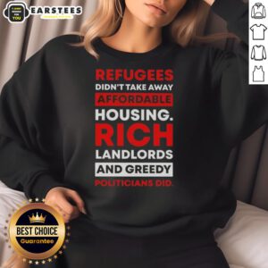 Official sweatshirt featuring the slogan 'Refugees Didn't Take Away Affordable Housing, Rich Landlords and Greedy Politicians Did.'