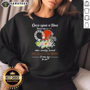 Alt Text: Cozy sweatshirt featuring the phrase Once Upon A Time There Was A Girl Who Loved Horses And Cleveland Browns.