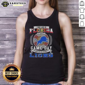 Trendy tank top featuring 'I May Live In Florida But On Game Day Detroit Lions Football' slogan, perfect for fans.