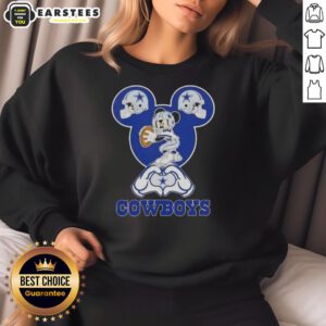 Top Mickey hands forming a heart on a Dallas Cowboys football sweatshirt, perfect for fans and stylish game day attire.