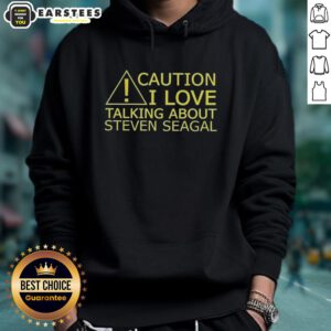 Awesome caution hoodie featuring 'I Love Talking About Steven Seagal' design, perfect for fans of the action star.