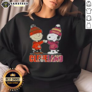 Alt Text: Awesome Charlie Brown and Snoopy Cleveland City Sports sweatshirt featuring Browns and Cavaliers logos.