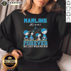 Alt Text: Awesome Snoopy and Charlie Brown Miami Marlins baseball sweatshirt, perfect for fans celebrating all seasons.