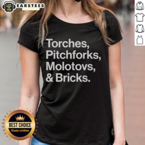 Awesome torches, pitchforks, Molotovs, and bricks graphic on a 2025 World Tour ladies tee, perfect for protest enthusiasts.