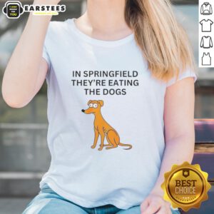 Funny Springfield They're Eating the Dogs Ladies Tee design featuring a humorous cartoon dog graphic on a stylish shirt.