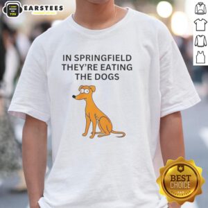 Alt Text: Funny In Springfield They're Eating The Dogs T-Shirt featuring a humorous cartoon dog design and vibrant colors.