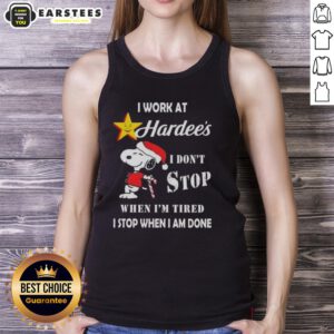 Funny Snoopy Christmas tank top with I work at Hardee's, I don't stop when I'm tired, I stop when I'm done slogan.