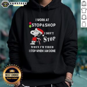Funny Snoopy Christmas hoodie with 'I don't stop when I'm tired, I stop when I'm done' text design.