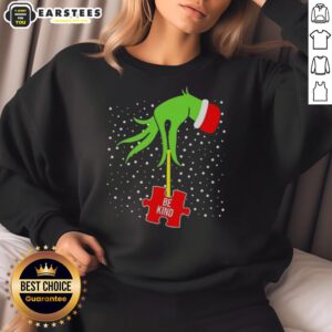 Alt Text: Good Grinch Hand Be Kind Puzzle Autism Awareness Christmas Sweatshirt featuring festive design and vibrant colors.