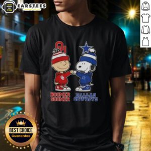 Charlie Brown fist bump with Snoopy on a Bommer Sooner X Dallas Cowboys T-shirt, perfect for fans and collectors.