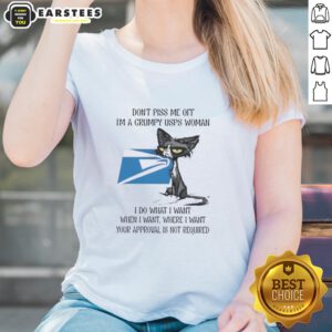 Grumpy USPS woman in a 'Nice Tired Cat' tee, exuding attitude with a playful message about doing what she wants.