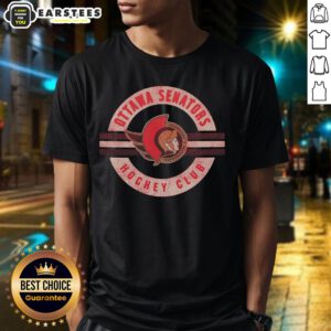 Alt Text: Original Ottawa Senators Surround T-Shirt featuring team logo and vibrant colors, perfect for fans and collectors.