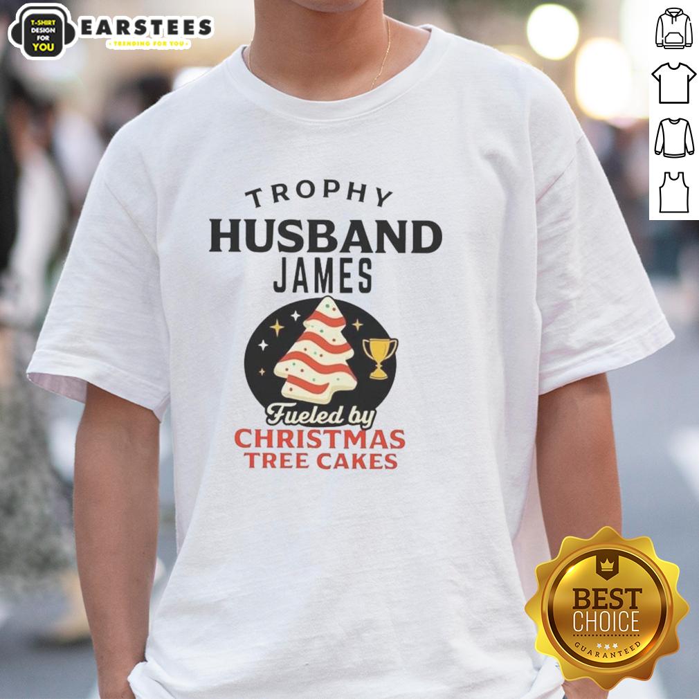 Alt Text: Premium Trophy Husband James wearing a Christmas Tree Cakes T-Shirt, showcasing holiday spirit and festive style.