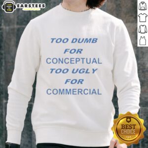 Pretty Too Dumb for Conceptual Tod Ugly for Commercial sweatshirt displayed on a hanger in a stylish urban setting.