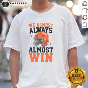 Funny football fan t-shirt featuring 'Pretty We Almost Always Almost Win' slogan, perfect for game day enthusiasm.