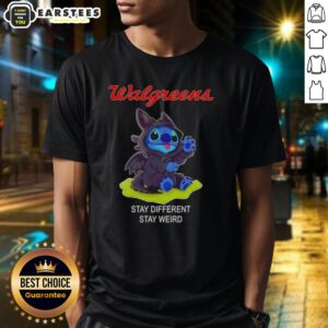 Adorable Stitch cosplay wearing a Toothless X Walgreens Stay Different Stay Weird T-shirt, showcasing unique style and creativity.