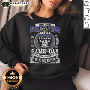 Alt Text: Fan wearing a Raiders football sweatshirt, showcasing pride for Las Vegas Raiders on game day in Pennsylvania.