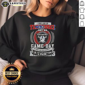 Alt Text: Fan wearing a 'Game Day' sweatshirt showing support for Las Vegas Raiders football while living in Tennessee.