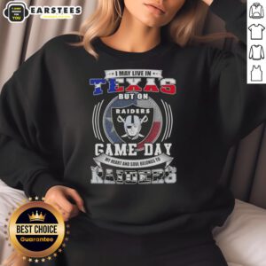Comfortable sweatshirt with 'I may live in Texas, but my heart belongs to Las Vegas Raiders' for football fans.