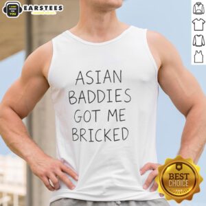 Person wearing a 'Nice Trump Asian Baddies Got Me Bricked' tank top, showcasing a fun and bold fashion statement.