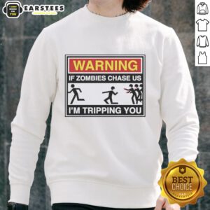 Original Warning: If Zombies Chase Us, I'm Tripping You Sweatshirt featuring a humorous zombie graphic design.