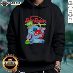 Cute Stitch hugs a red robin logo on a Happy St. Patrick's Day hoodie, perfect for festive celebrations.