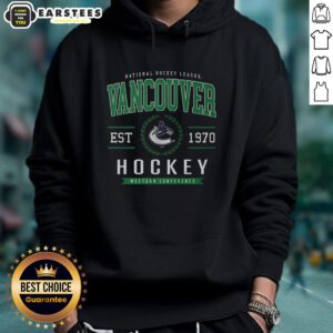 Alt Text: Cozy Vancouver Canucks hoodie featuring the classic hockey legacy crest, perfect for fans and chilly game days.