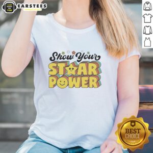 Teacher and student wearing 'Show Your STAAR Power' tees, celebrating motivation for testing day in a classroom setting.