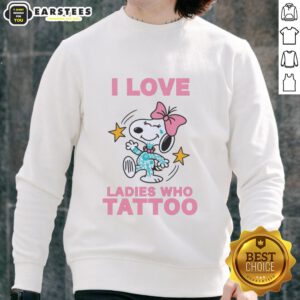 Original Snoopy wearing a pink bow on 'I Love Ladies Who Tattoo' sweatshirt, perfect for tattoo lovers.