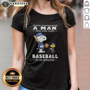 Alt Text: Cute Peanuts x Toronto Blue Jays tee for women celebrates seniors playing baseball in their seventies with style.
