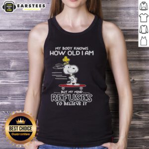 Alt Text: Snoopy and Woodstock tank top featuring 'My body knows how old I am, but my mind refuses to believe it' quote.